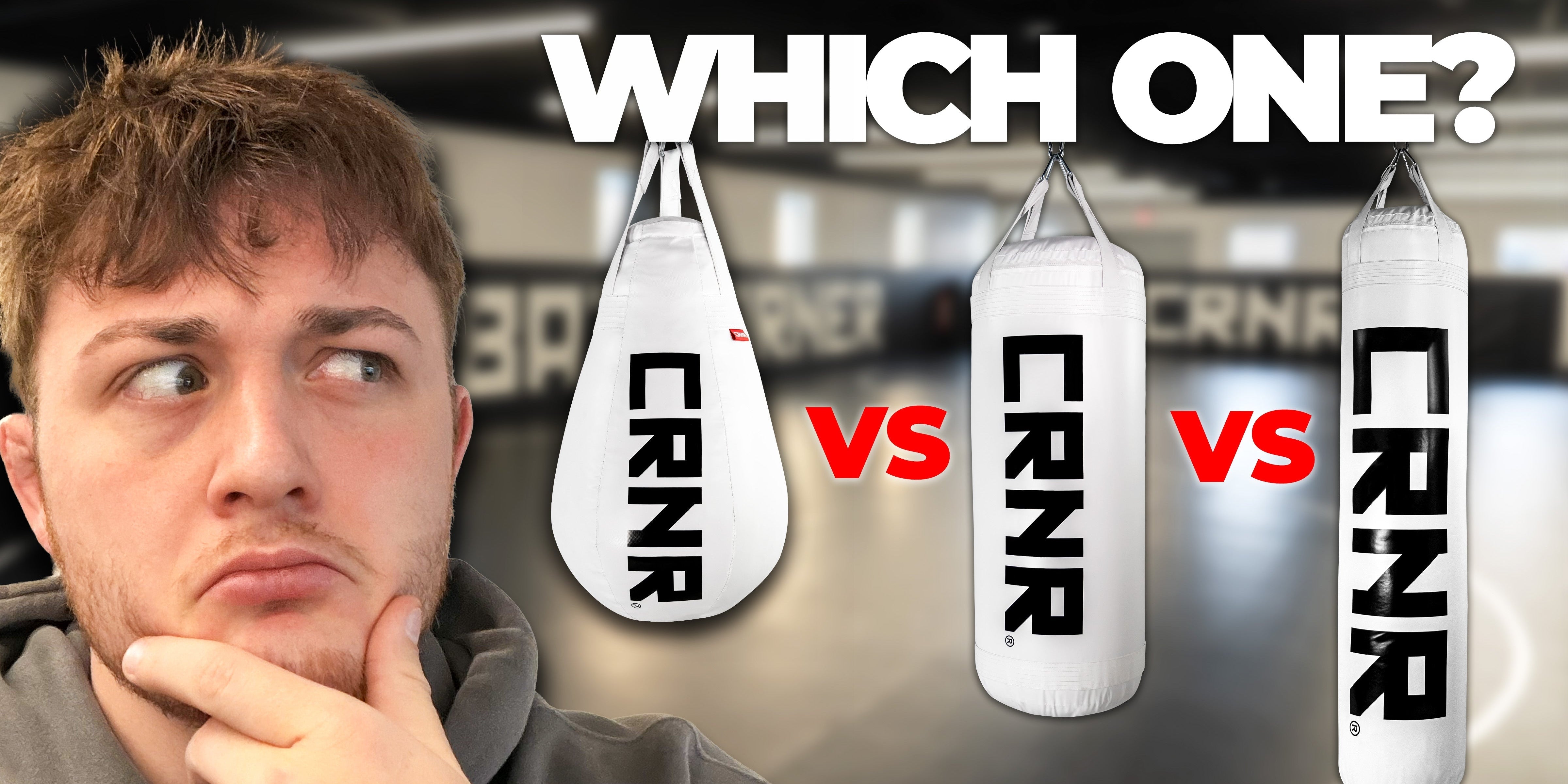 Product guide thumbnail asking "WHICH ONE?" comparing three white Combat Corner punching bags with a thinking man on the left.