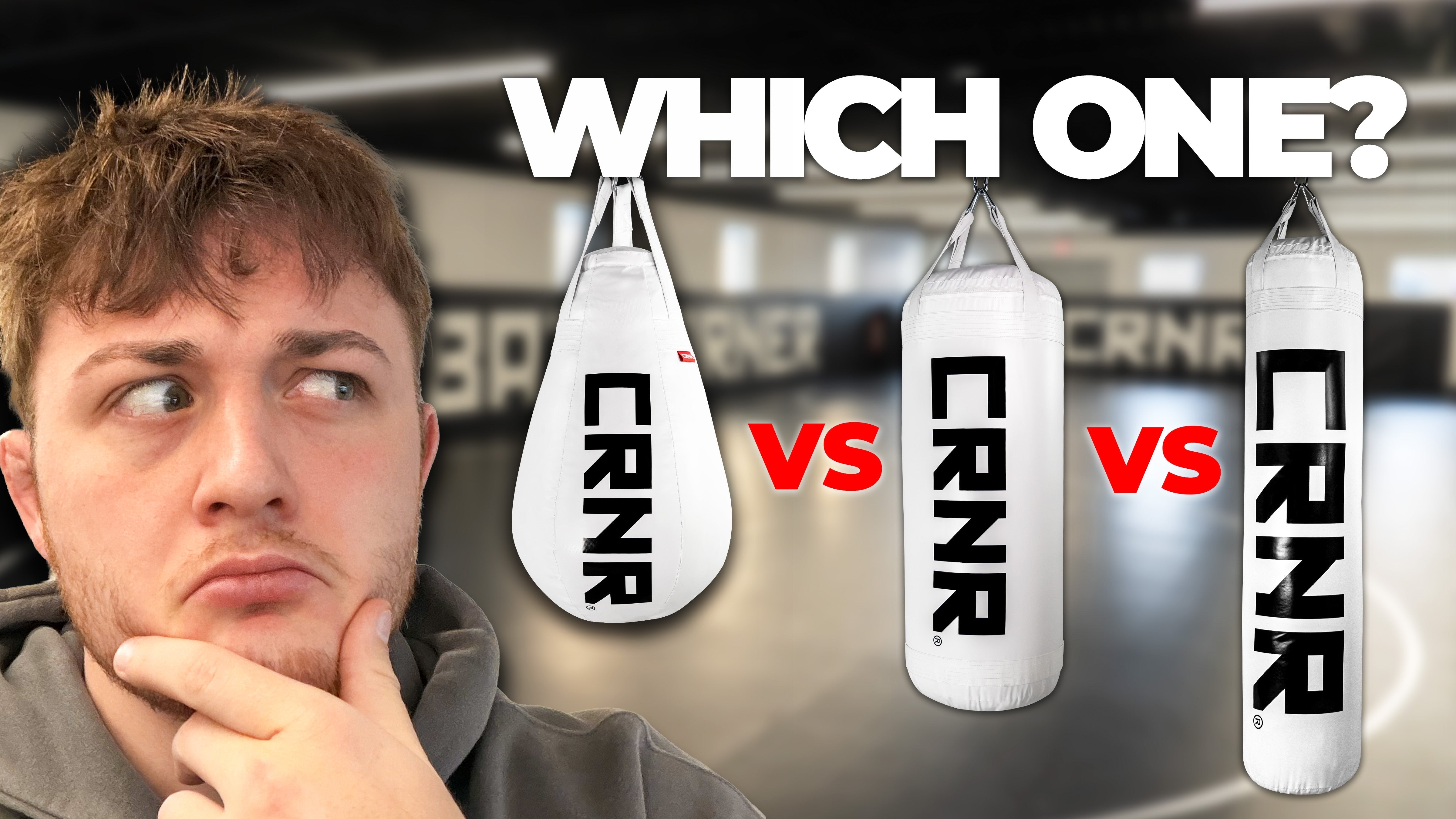 Product guide thumbnail asking "WHICH ONE?" comparing three white Combat Corner punching bags with a thinking man on the left.
