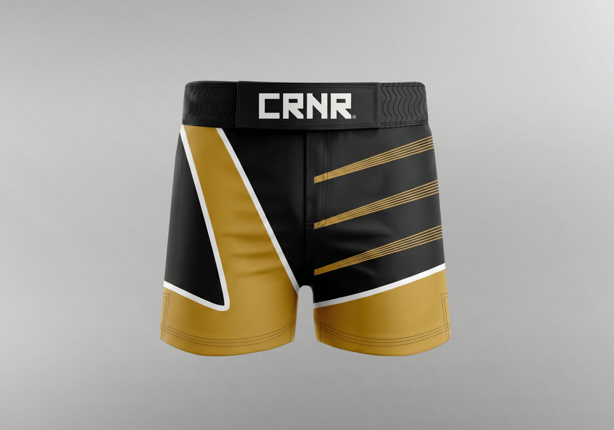 A pair of custom black and gold MMA fight shorts by Combat Corner, featuring geometric panels, gold horizontal accent stripes, and a prominent "CRNR" logo on the flat waistband.