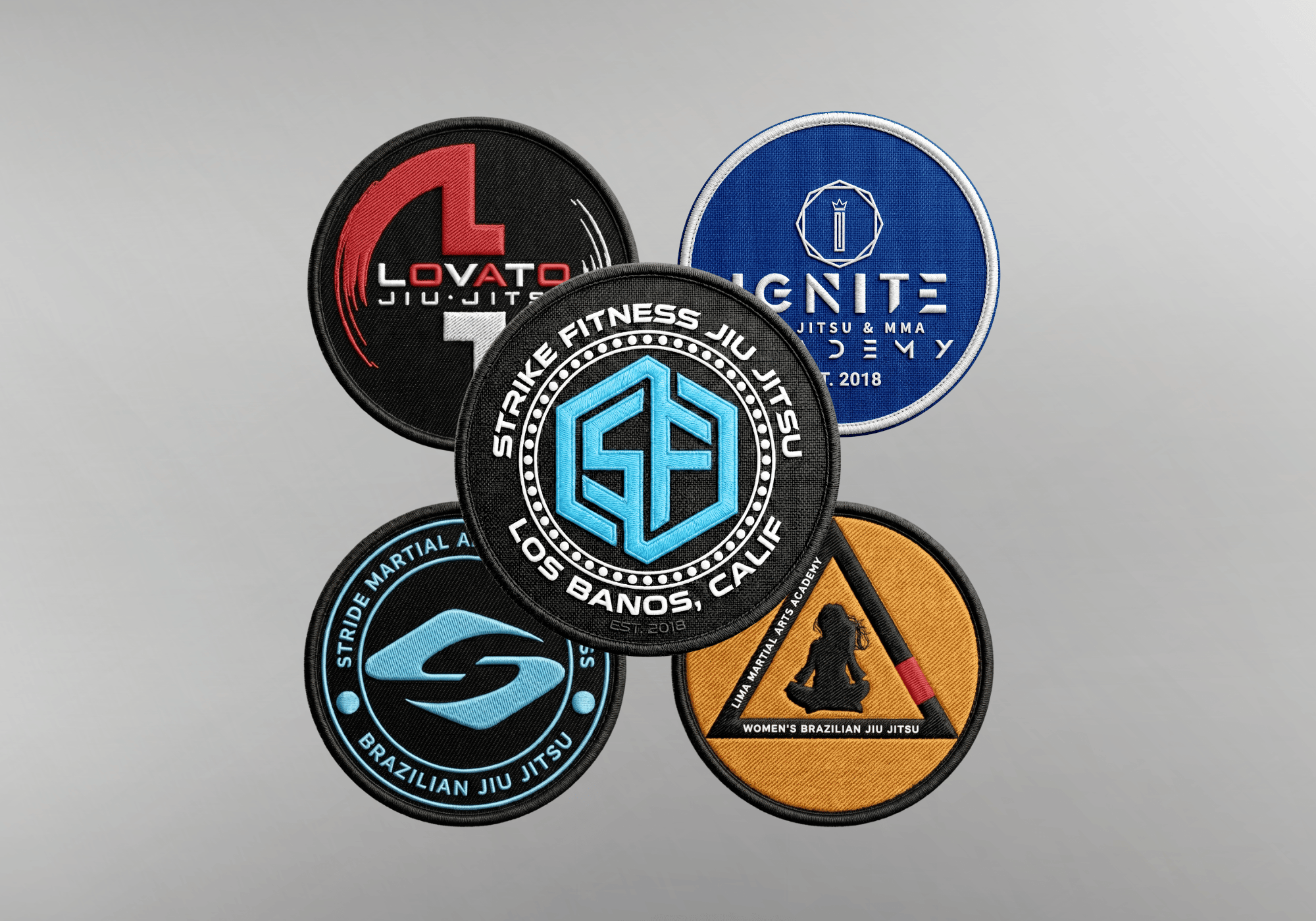 A collection of five custom embroidered martial arts patches by Combat Corner, featuring various circle and triangle designs for different Jiu Jitsu academies.