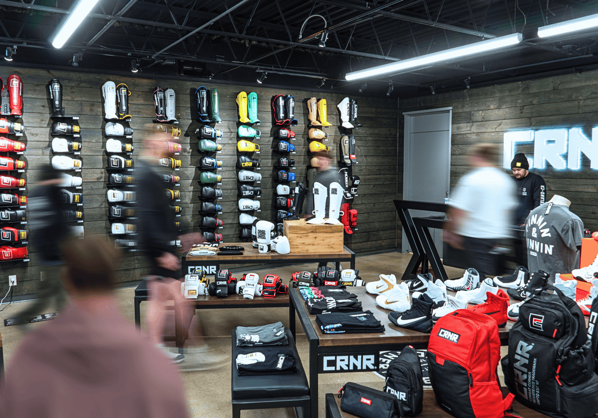 A photo of athletes shopping at the flagship Combat Corner Store at Combat Corner Headquarters in Milwaukee, Wisconsin., 