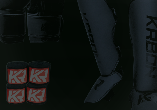 A product display of black combat sports gear from Combat Corner against a dark background, including hand wraps, mouthguards, boxing gloves, and shin guards.