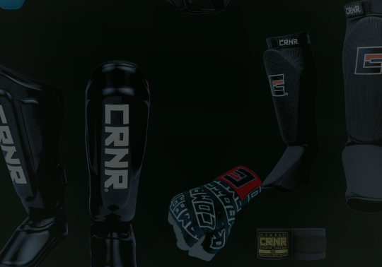 A product display of black combat sports gear from Combat Corner against a dark background, including mouthguards, hand wraps, and shin guards.