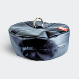 Front-right angle view of the black CRNR Punching Bag Anchor with a top metal ring.