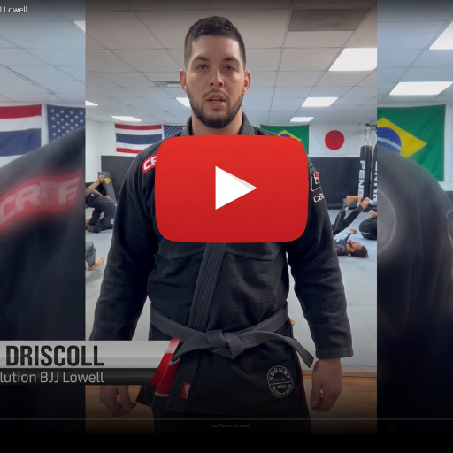 A video thumbnail of Derek Driscoll's customer review of Combat Corner. The thumbnail features Brazilian Jiu Jitsu practitioner Derek Driscoll wearing a black Combat Corner BJJ Gi and a black belt inside a training gym, overlaid with a red YouTube play button.