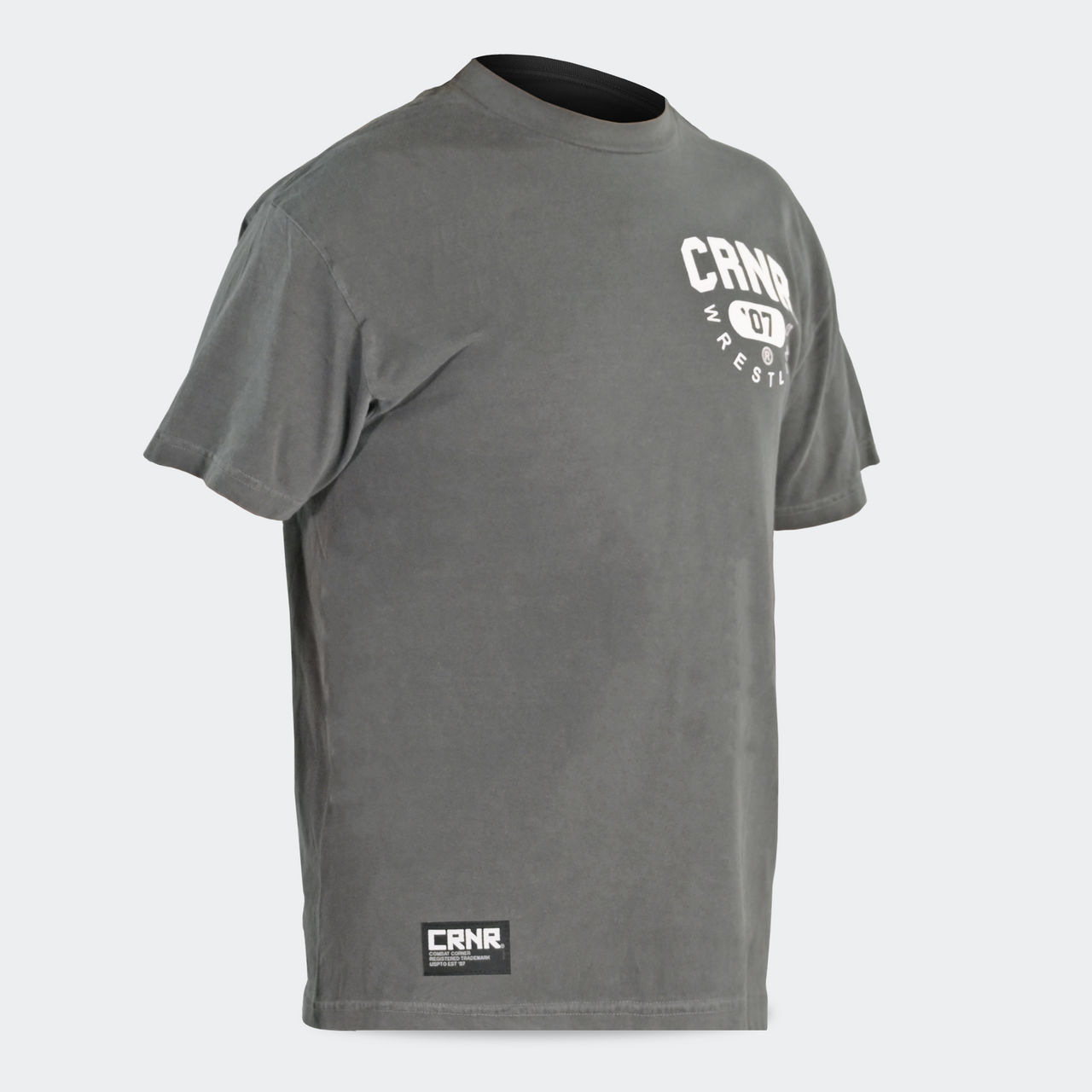 Product photo of Combat Corner’s exclusive Pinnin’ & Winnin’ Relaxed Tee. This photo shows the front left angle of Combat Corner’s Pinnin’ & Winnin’ Faded Navy Relaxed Tee. This CRNR tee offers the same softness and comfort as your favorite, well-loved vintage tee.