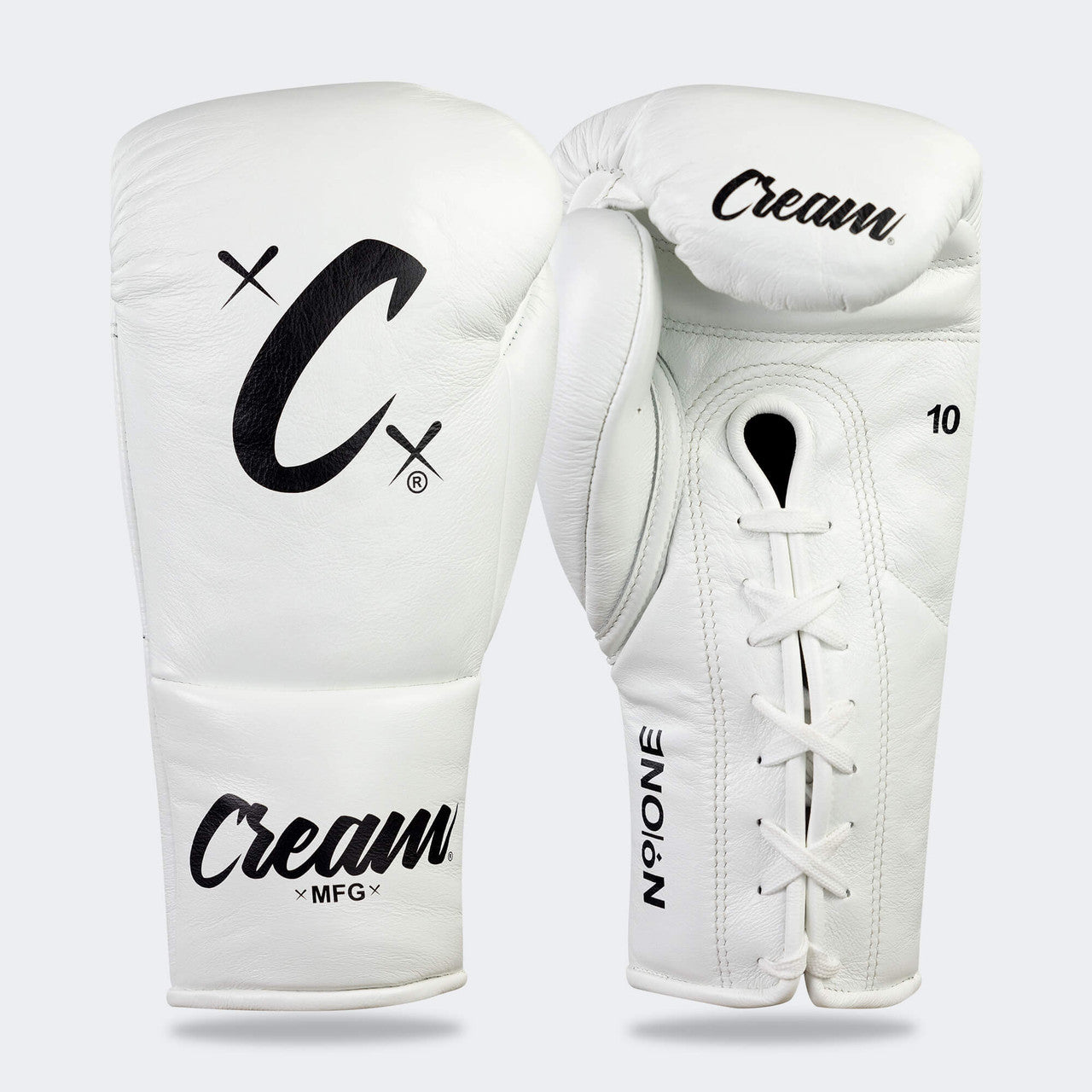 Photo of a pair of Combat Corner's white Cream TM1 Competition Boxing Gloves, which are Japanese inspired Mexican Boxing Gloves that are hand made in Thailand.