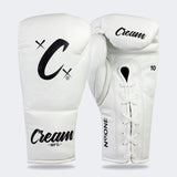 Photo of a pair of Combat Corner's white Cream TM1 Competition Boxing Gloves, which are Japanese inspired Mexican Boxing Gloves that are hand made in Thailand.