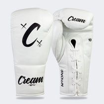 Photo of a pair of Combat Corner's white Cream TM1 Competition Boxing Gloves, which are Japanese inspired Mexican Boxing Gloves that are hand made in Thailand.
