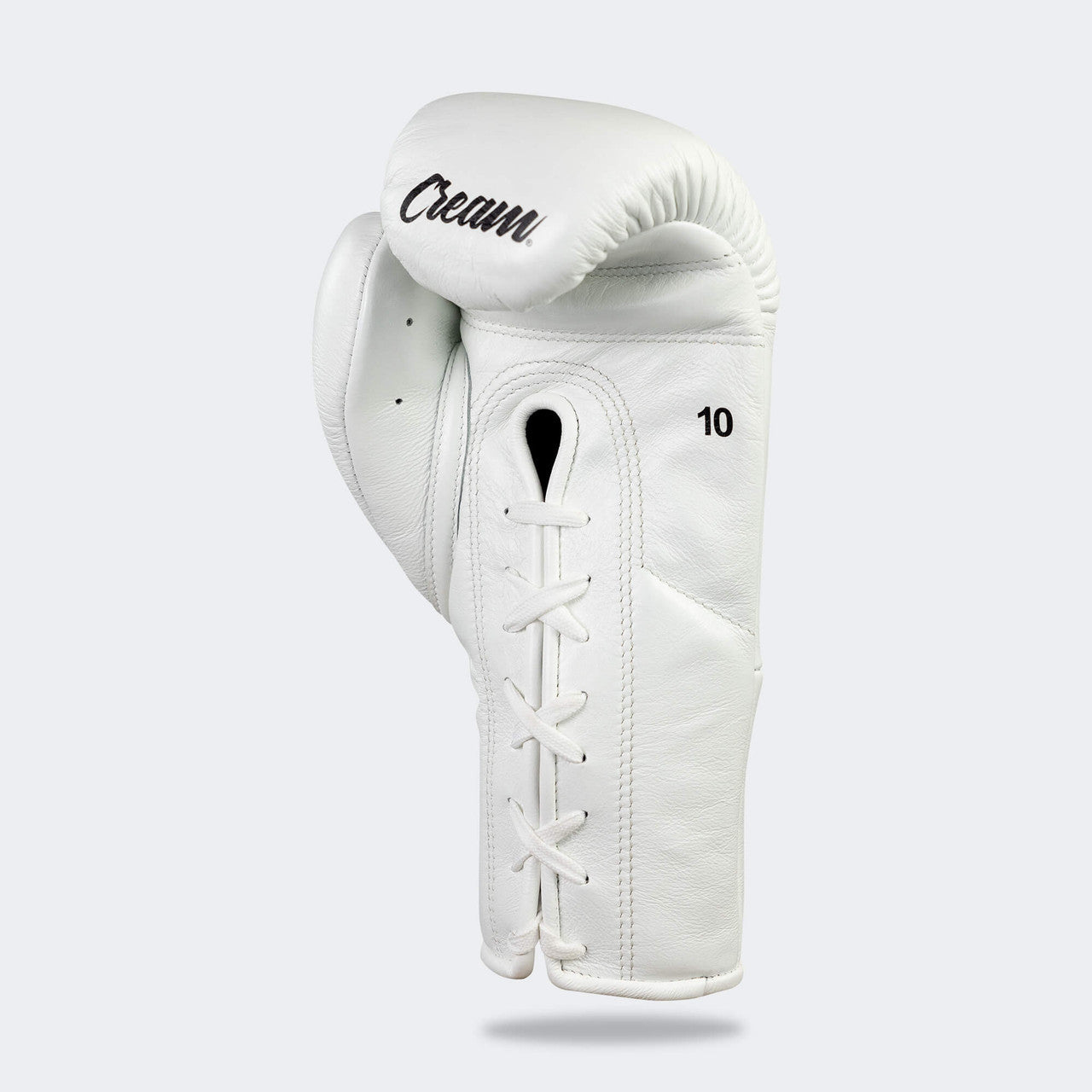 Photo of the palm left side of Combat Corner's white Cream TM1 Competition Boxing Gloves, which are Japanese inspired Mexican Boxing Gloves that are hand made in Thailand.