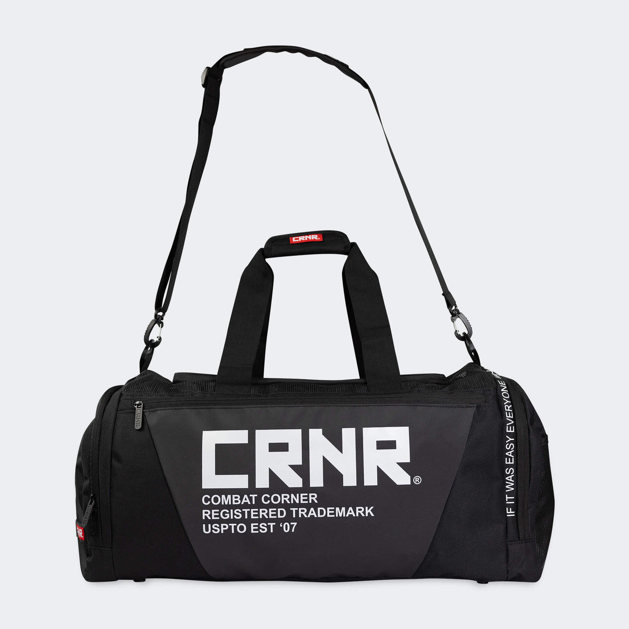 Product photo of the front of the Combat Corner Essential Gear Bag showing the bag's extended deluxe shoulder carrying straps