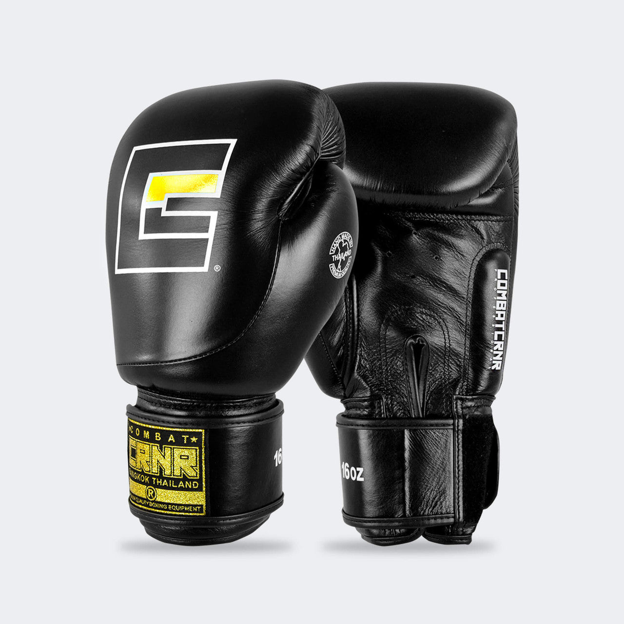 A product photo of Combat Corner's black HMIT Boxing Gloves. The photo shows the front of a pair CRNR HMIT black Boxing Gloves. These black HMIT Boxing Gloves come in 12 once gloves, 14 once gloves, and 16 once gloves. These black Combat Corner HMIT Boxing Gloves work for multiple striking combat sports. These gloves can be used as Muay Thai Gloves, Boxing Gloves, Thai Boxing Gloves, Sparring Gloves, and more.