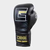 Photo of the front left side of Combat Corner's black HMIT Lace Up Sparring Gloves, which are Mexican Boxing Gloves that are hand made in Thailand.