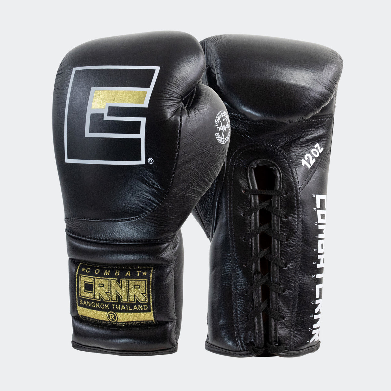 Photo of a pair of Combat Corner's black HMIT Lace Up Sparring Gloves, which are Mexican Boxing Gloves that are hand made in Thailand.