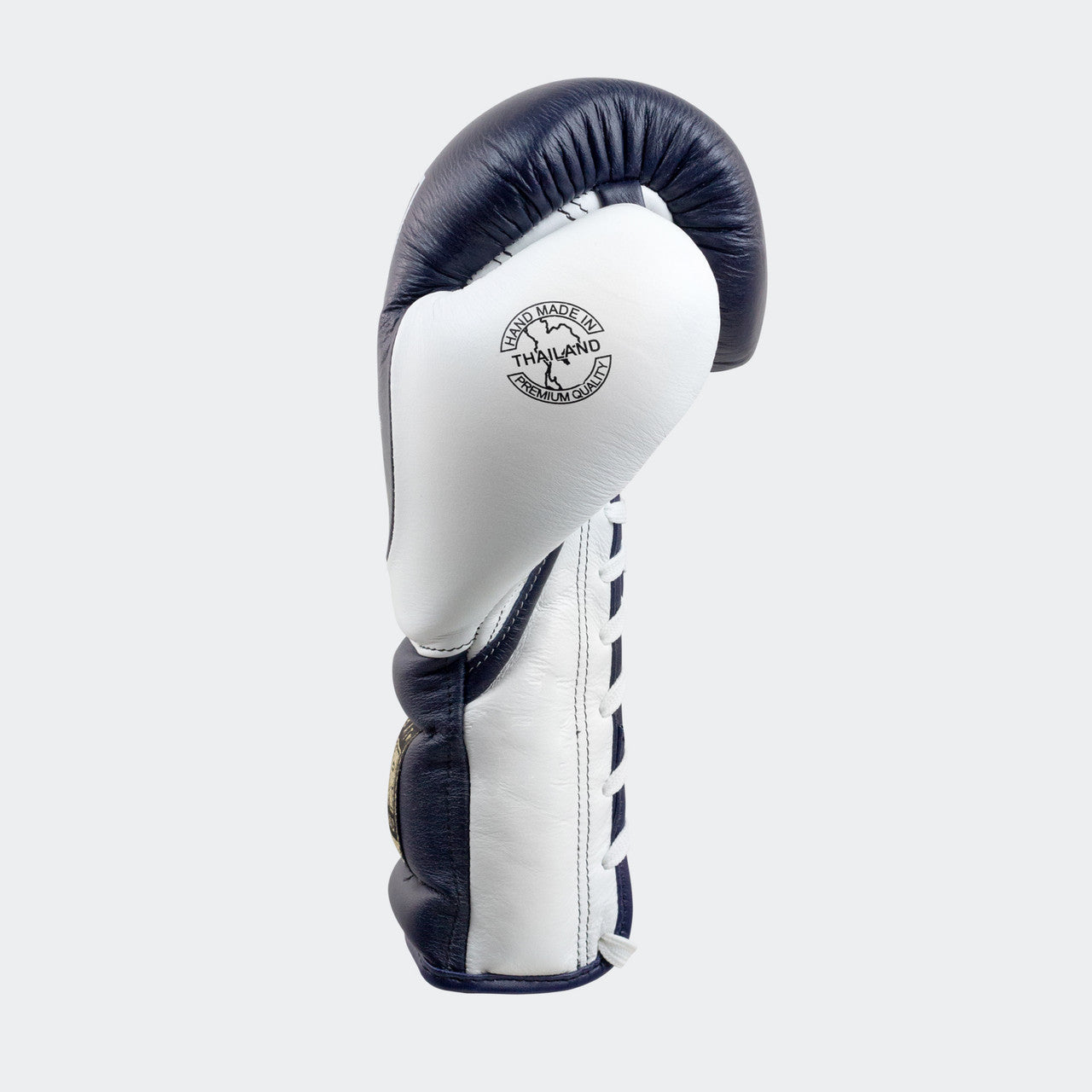 Photo of the left side of Combat Corner's navy HMIT Lace Up Sparring Gloves, which are Mexican Boxing Gloves that are hand made in Thailand.