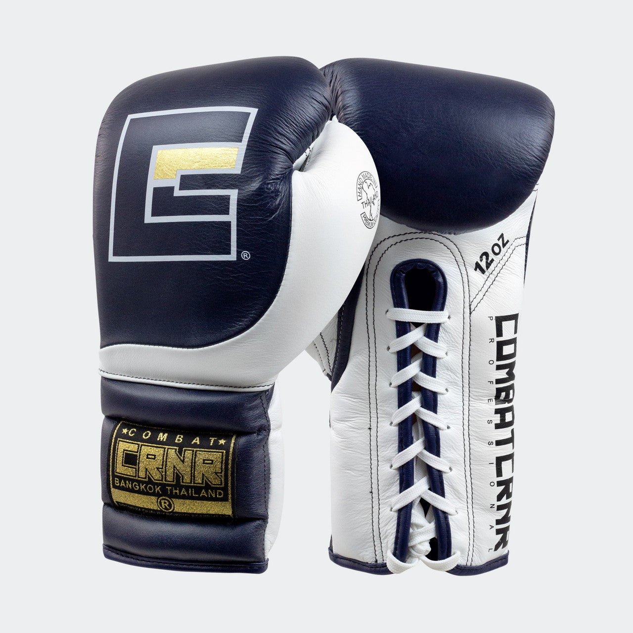Photo of a pair of Combat Corner's navy HMIT Lace Up Sparring Gloves, which are Mexican Boxing Gloves that are hand made in Thailand.