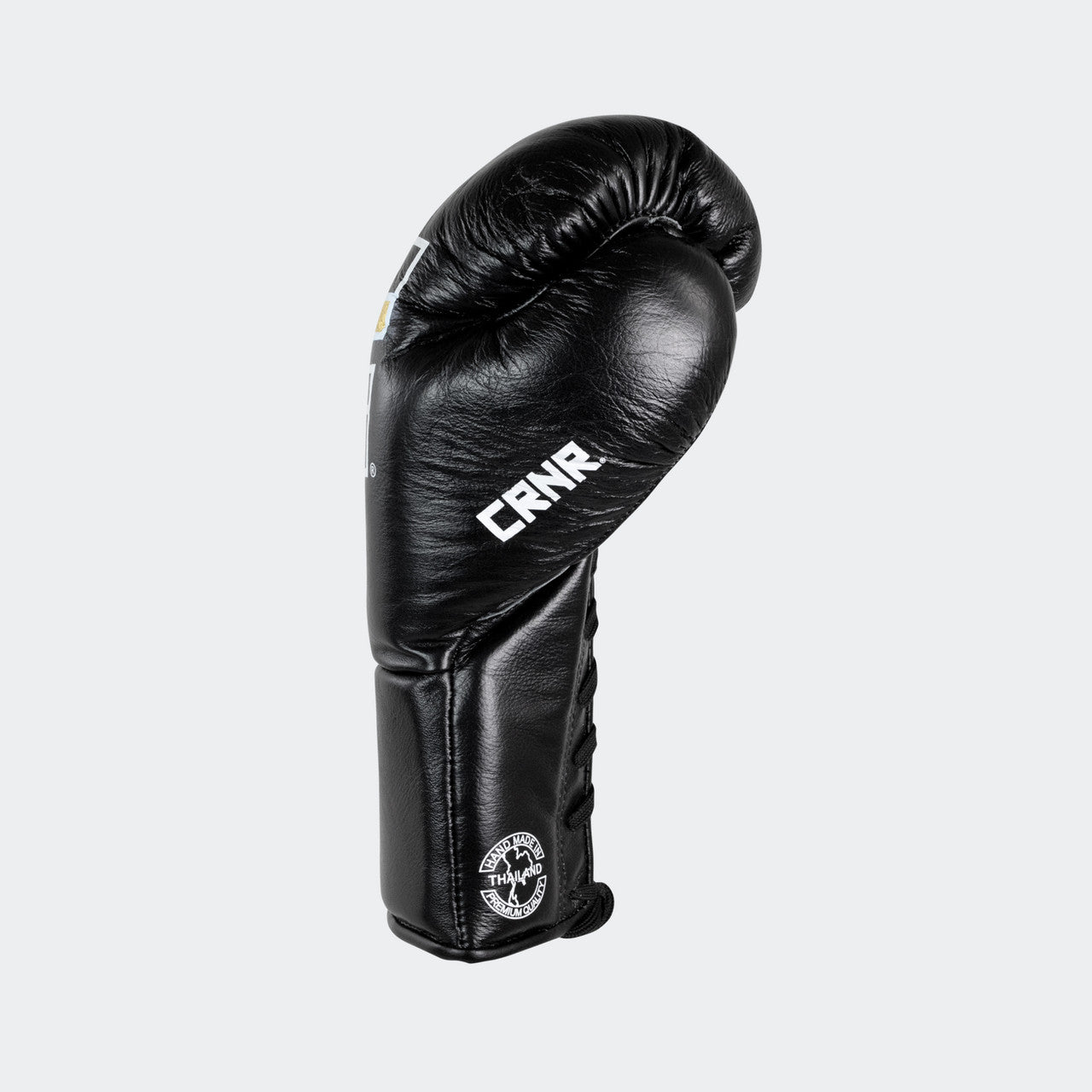 Photo of the left side of Combat Corner's black Punchers Professional Fight Gloves, which are Mexican Boxing Gloves that are hand made in Thailand.
