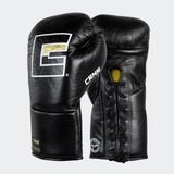 Photo of a pair of Combat Corner's black Punchers Professional Fight Gloves, which are Mexican Boxing Gloves that are hand made in Thailand.