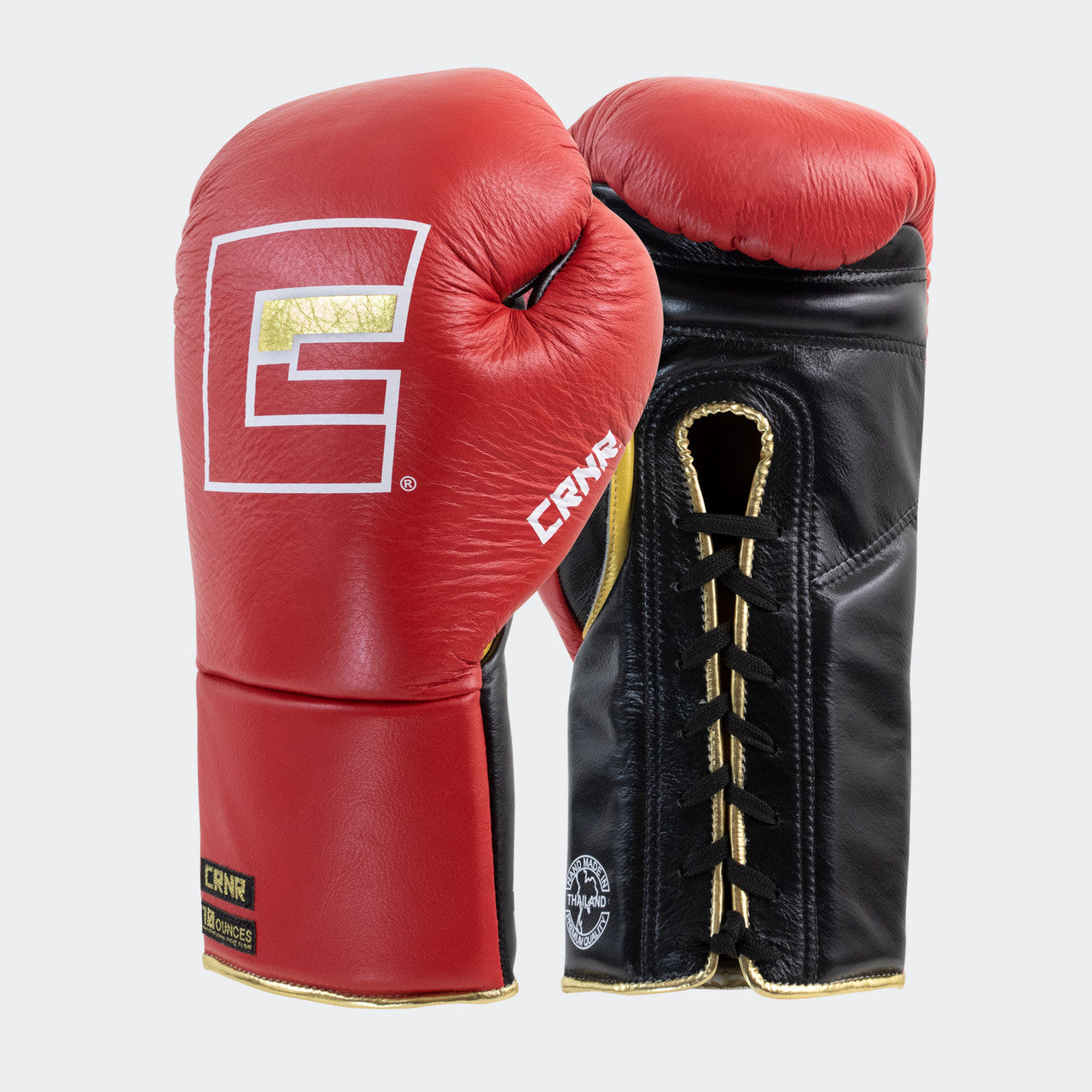 Photo of a pair of Combat Corner's red Punchers Professional Fight Gloves, which are Mexican Boxing Gloves that are hand made in Thailand.