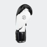 Photo of the left side of Combat Corner's black and white HMIT Velcro Sparring Gloves, which are Mexican Boxing Gloves that are hand made in Thailand.