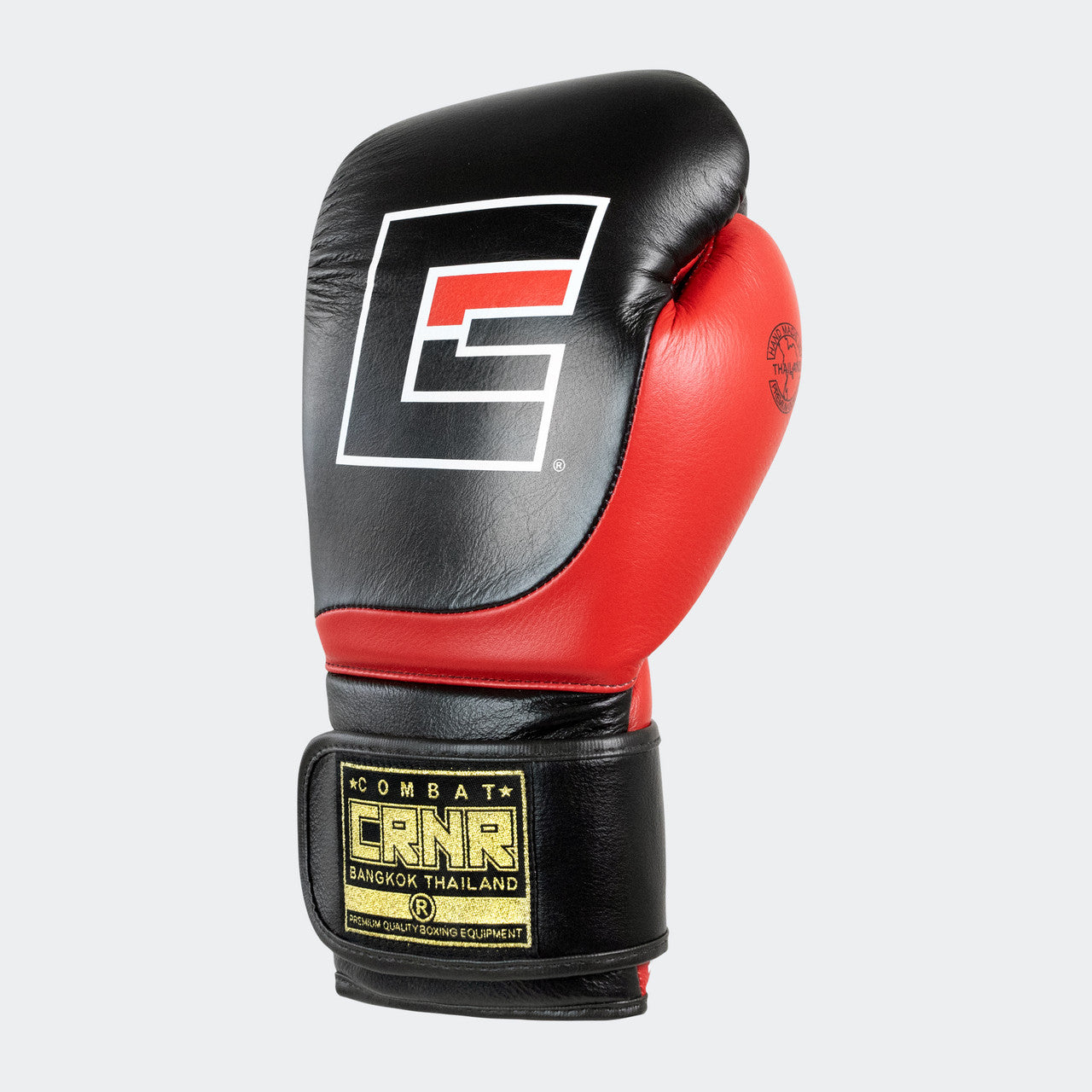 Photo of the front left of Combat Corner's black and red HMIT Velcro Sparring Gloves, which are Mexican Boxing Gloves that are hand made in Thailand.
