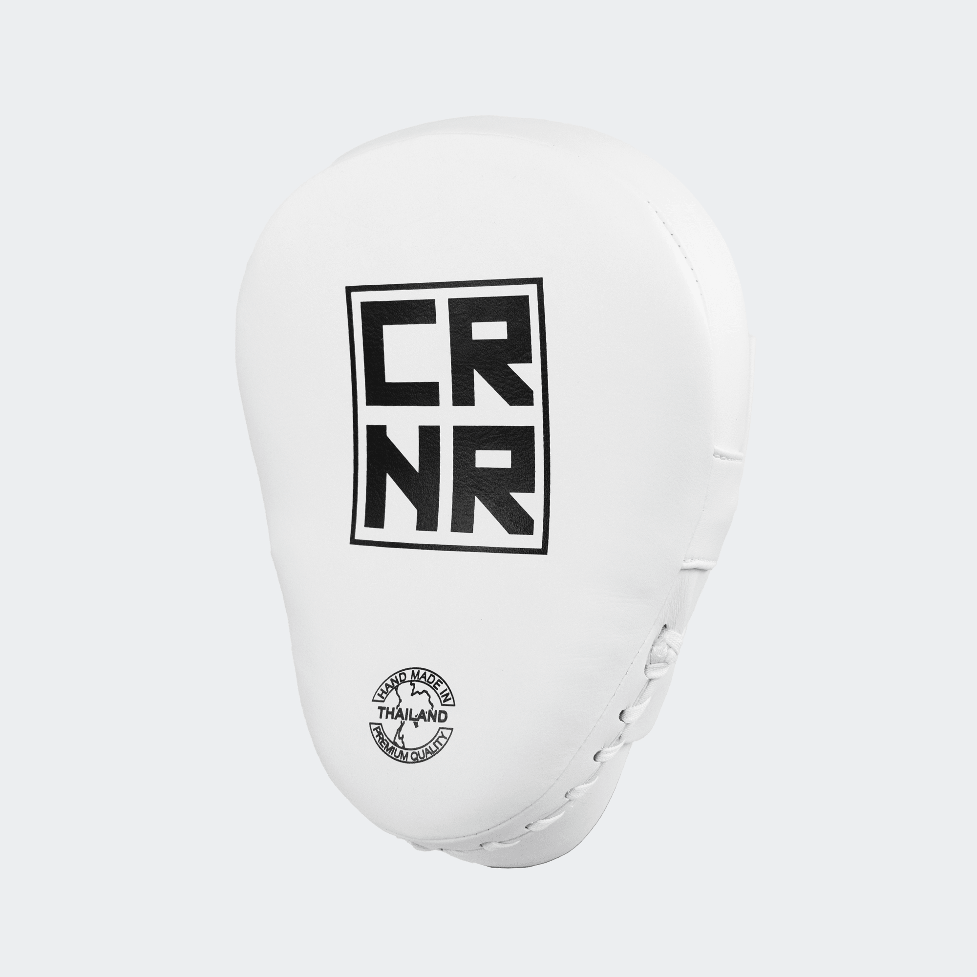 The front of the white HMITV Curved Punch Mitts by Combat Corner against a solid light grey background, showcasing the curved hand compartment and front striking surface.
