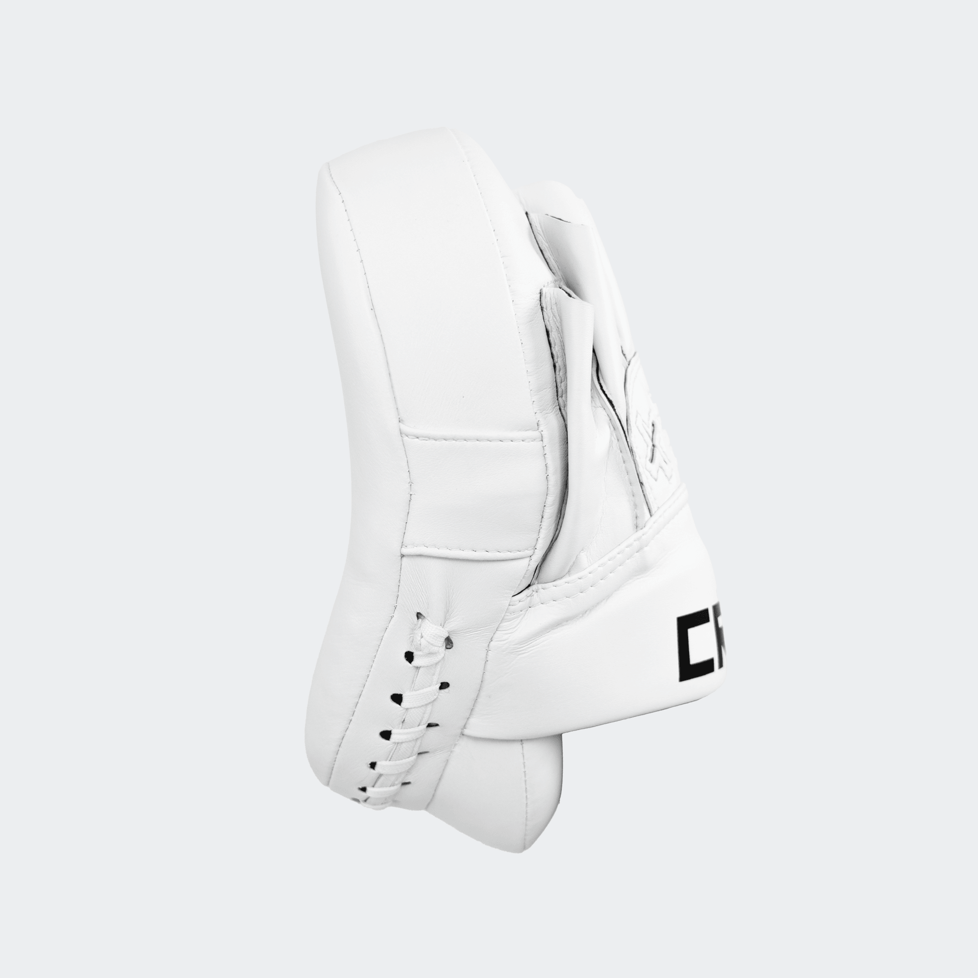 The right side view of the white HMITV Curved Punch Mitts by Combat Corner against a solid light grey background, showcasing the curved hand compartment and front striking surface.