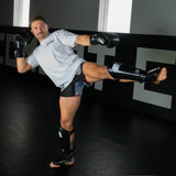 Man kicking muay thai