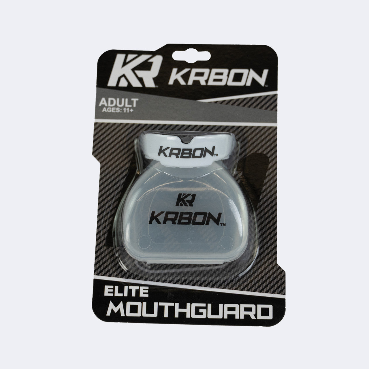 Photo of the front packaging for Combat Corner's white KRBON Elite Mouthguard for MMA, Boxing, Muay Thai, Wrestling, and More