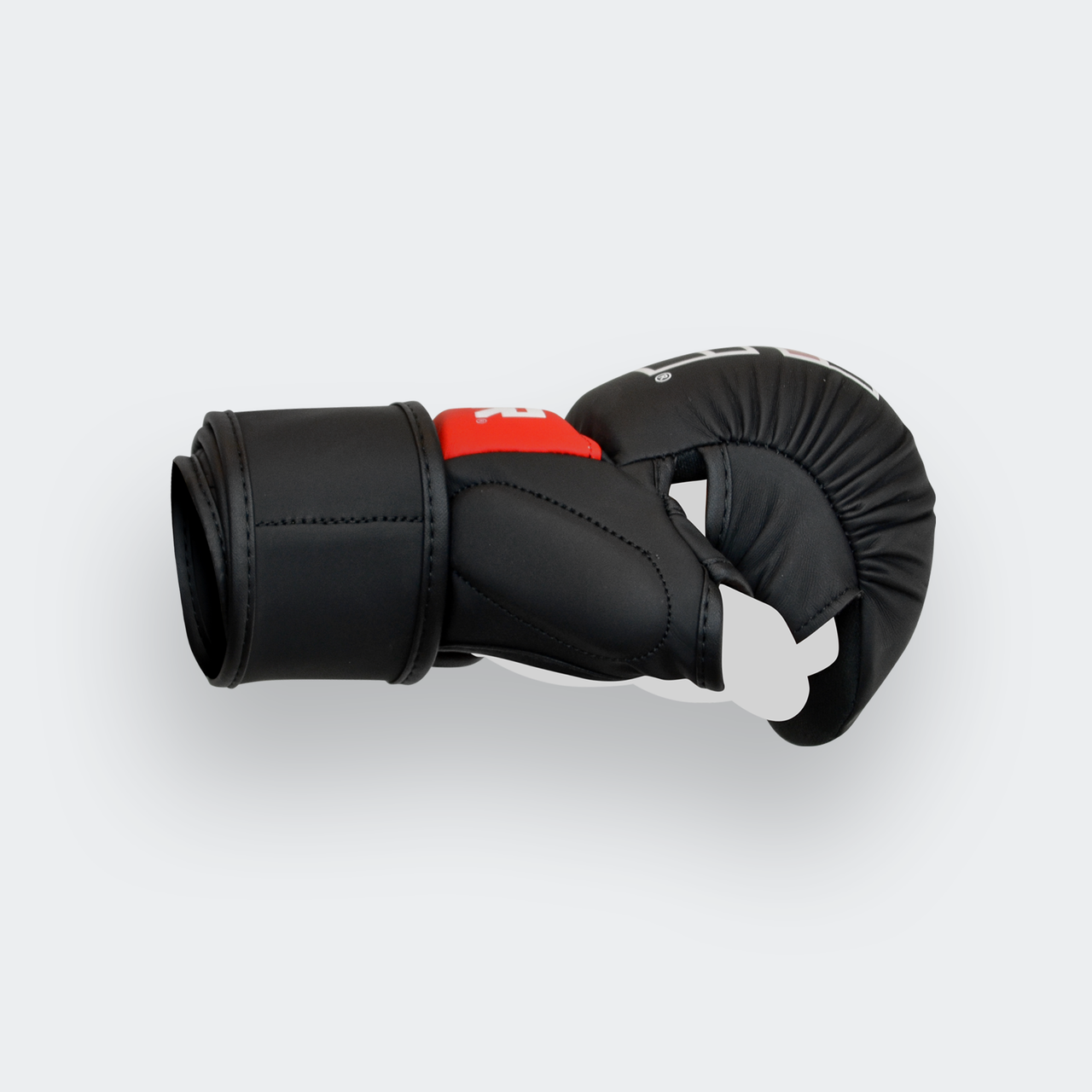 Product photo of the inside left side of the black Combat Corner Kids MMA Spar Gloves