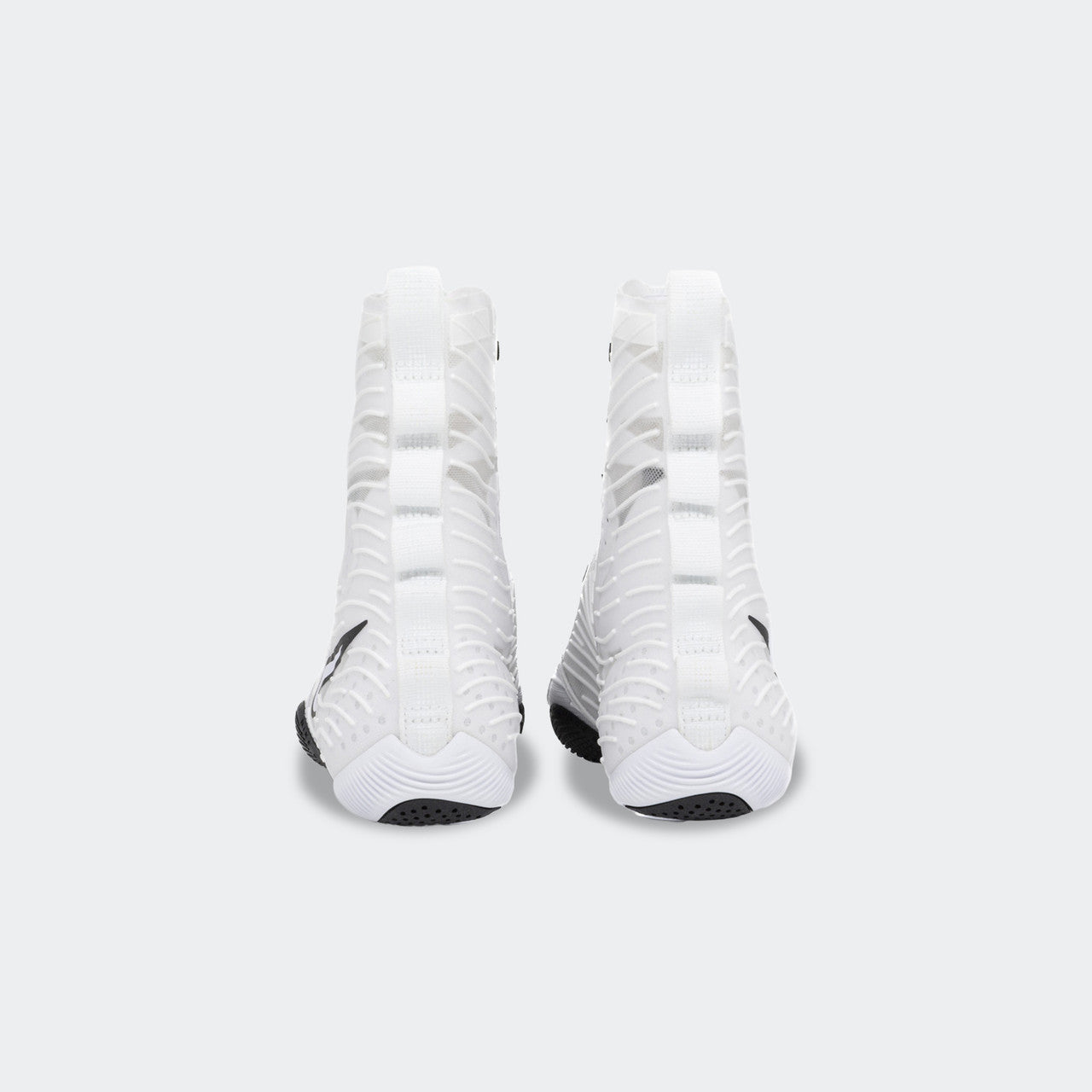 Back heel view of a pair of Nike HyperKO 3 boxing shoes in white, available at Combat Corner.