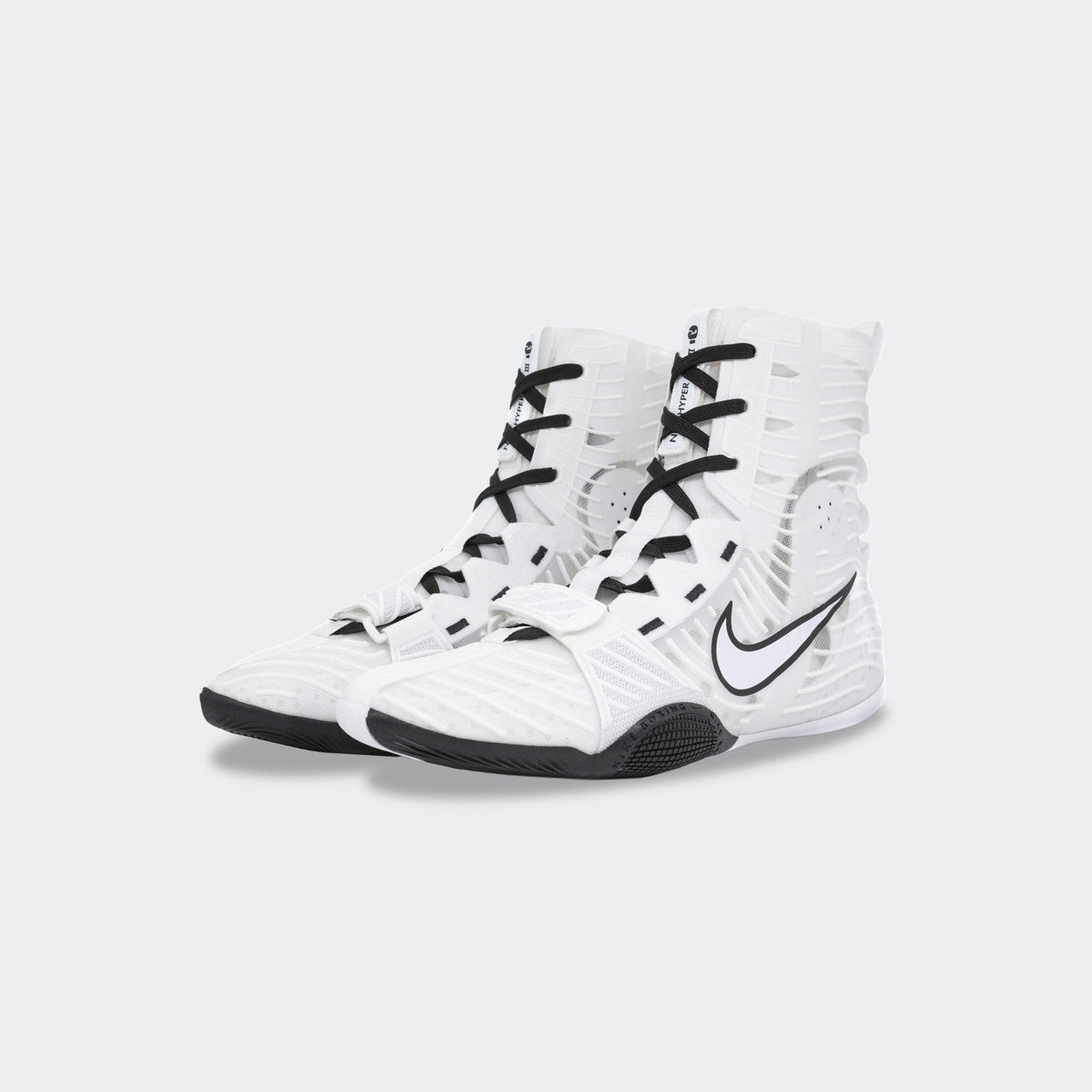 Pair of Nike HyperKO 3 boxing shoes in white, viewed from a front-right angle, available at Combat Corner.