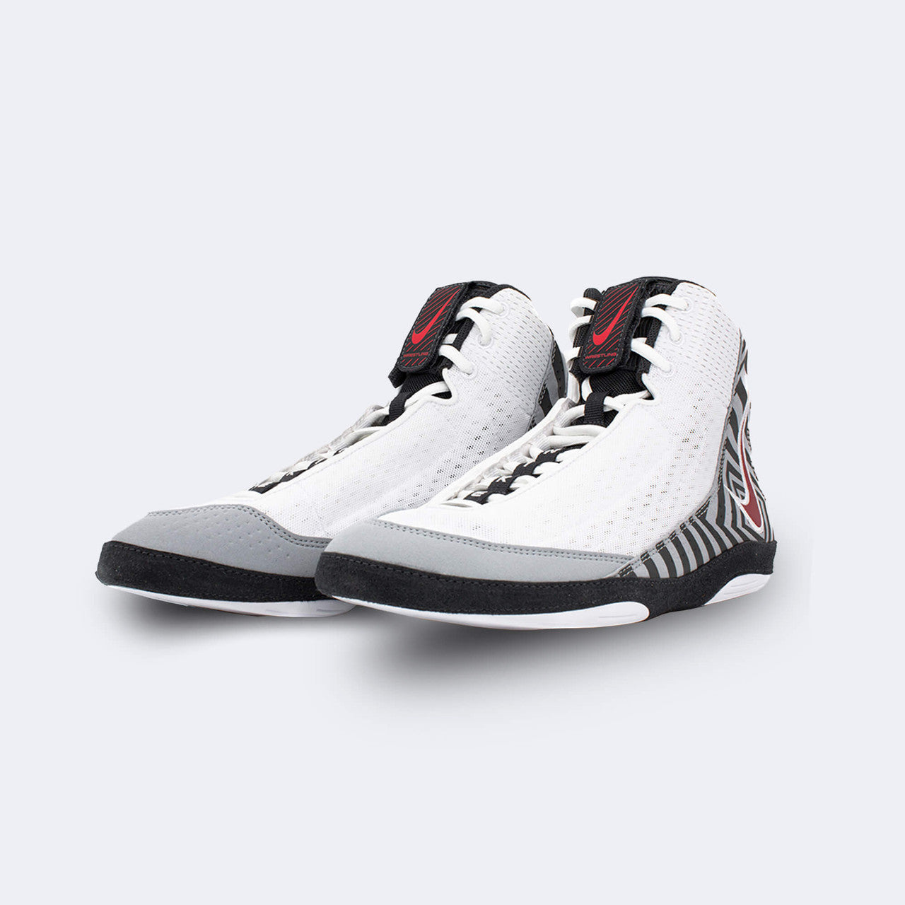A pair of the Nike Inflict 4 wrestling shoes in SE University from the front left angle, available from Combat Corner.