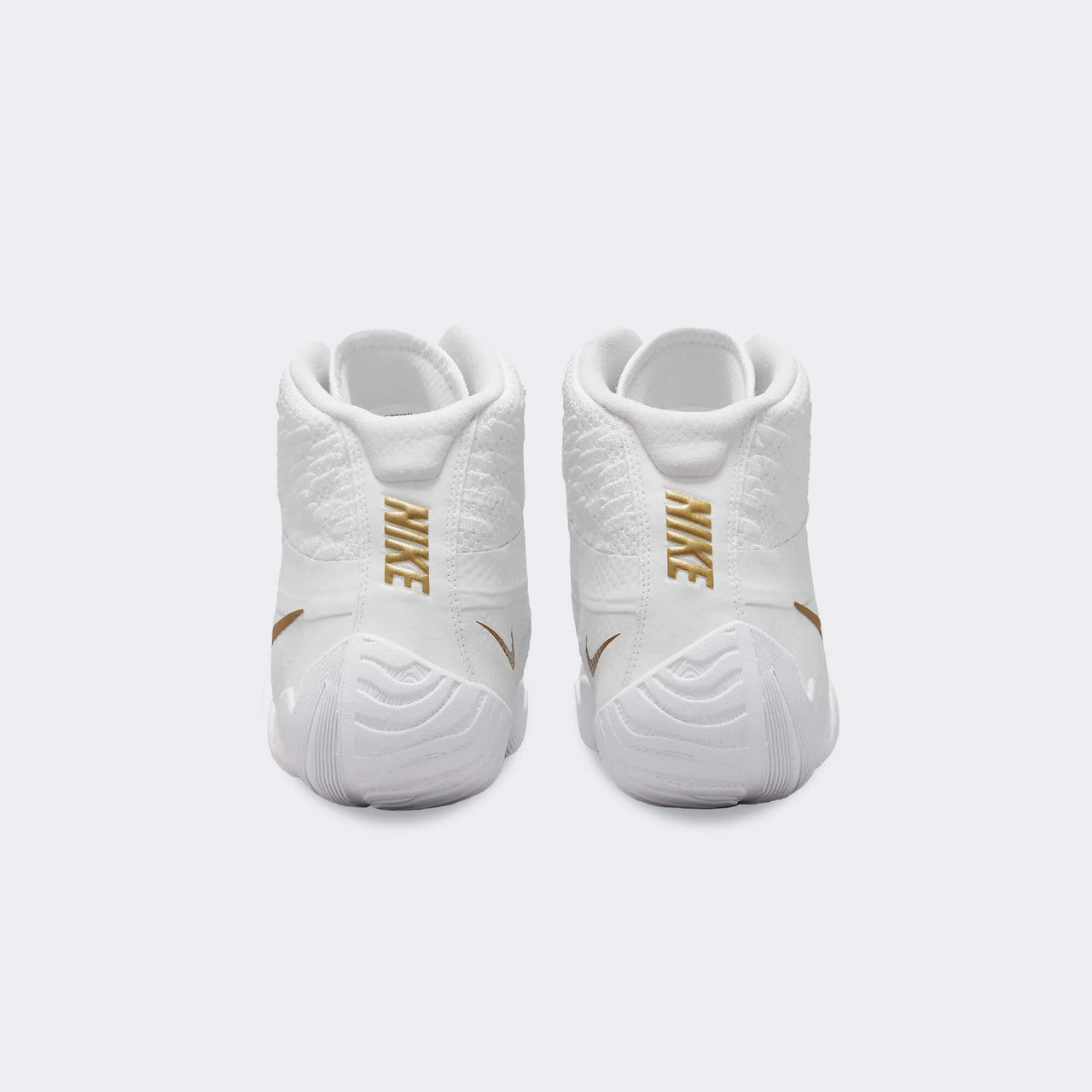 Back heel view of the Nike Tawa wrestling shoes in white, available at Combat Corner.