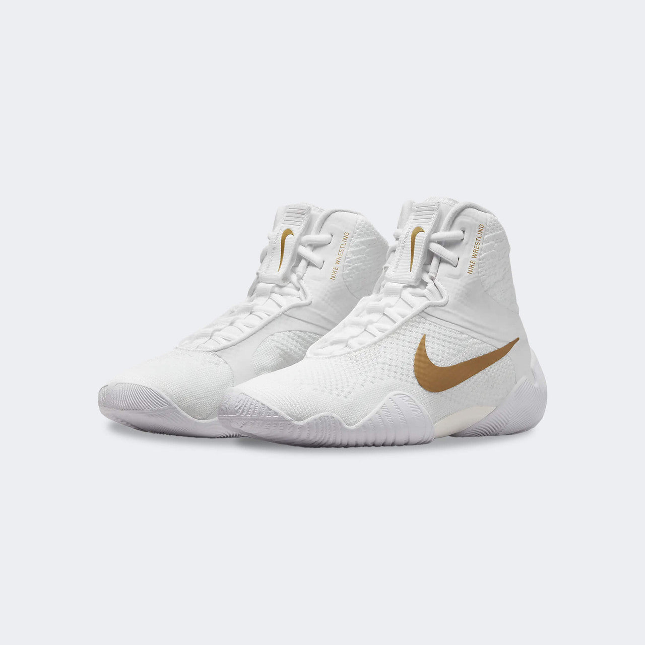 A pair of the Nike Tawa wrestling shoes in white from the front left angle, available from Combat Corner.