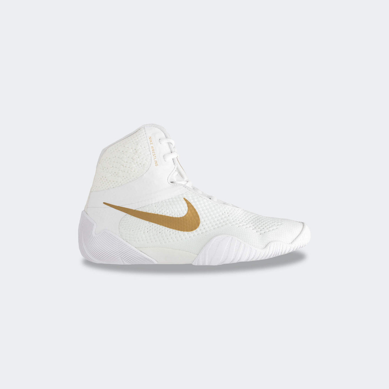 Inner left side view of the Nike Tawa wrestling shoe in white, available at Combat Corner.