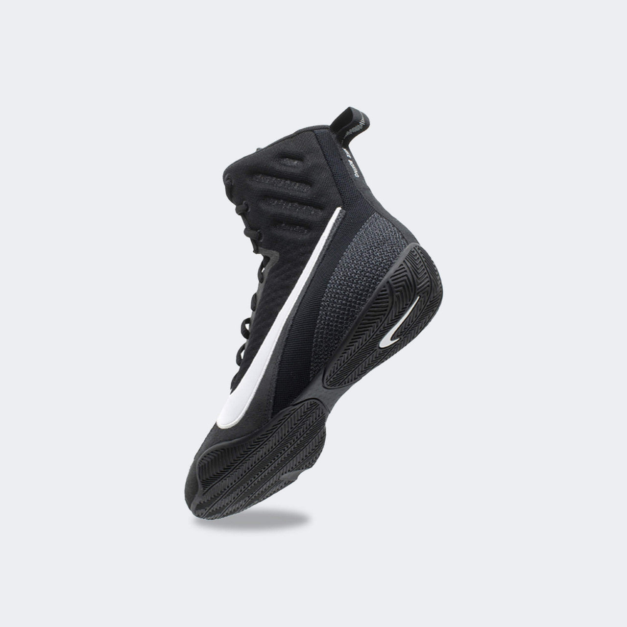 Back-left perspective view of the Nike Machomai 3 boxing shoe in black, available from Combat Corner.