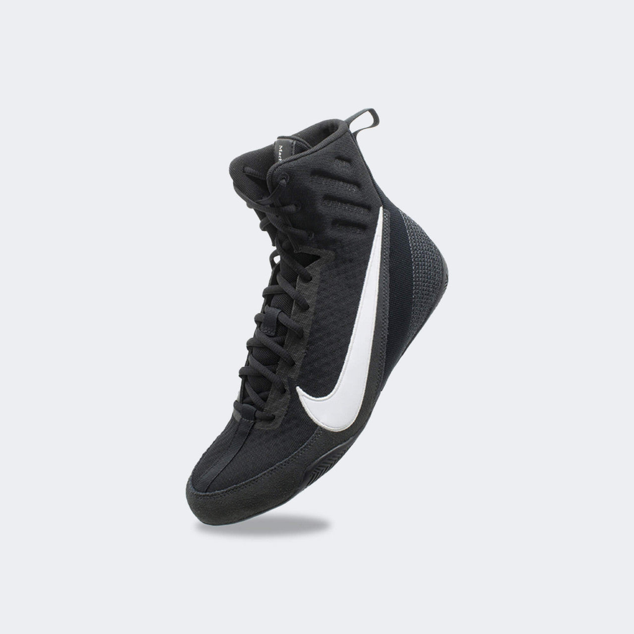Front-left perspective view of the Nike Machomai 3 boxing shoe in black, available at Combat Corner.
