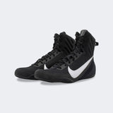 Pair of Nike Machomai 3 boxing shoes in black, viewed from a front-left angle, available at Combat Corner.