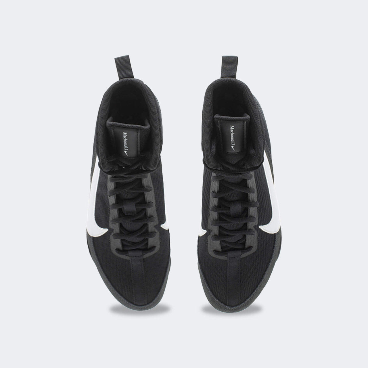 Top down view of a pair of Nike Machomai 3 boxing shoes in black, available at Combat Corner.