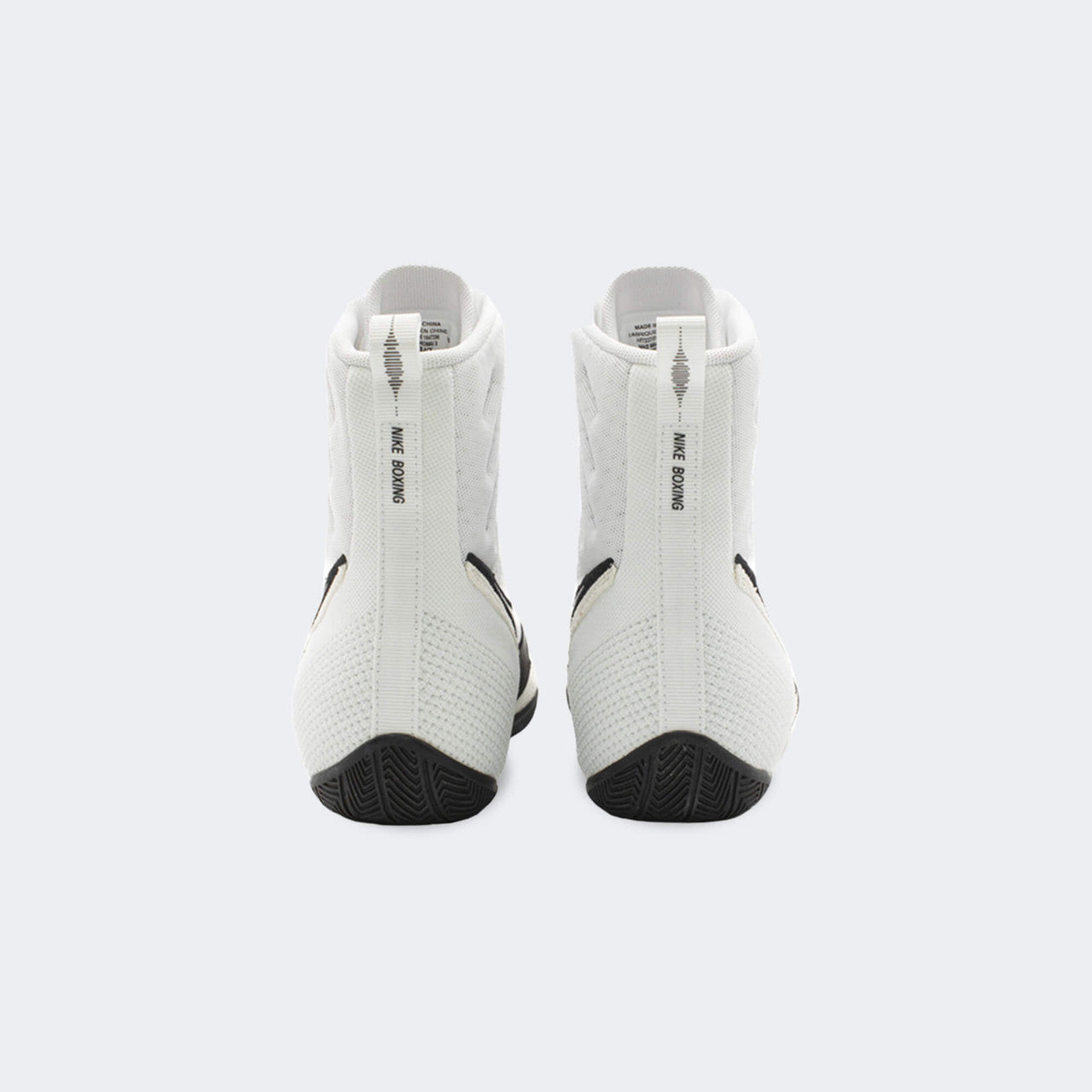 Back heel view of the Nike Machomai 3 boxing shoes in white, available at Combat Corner.