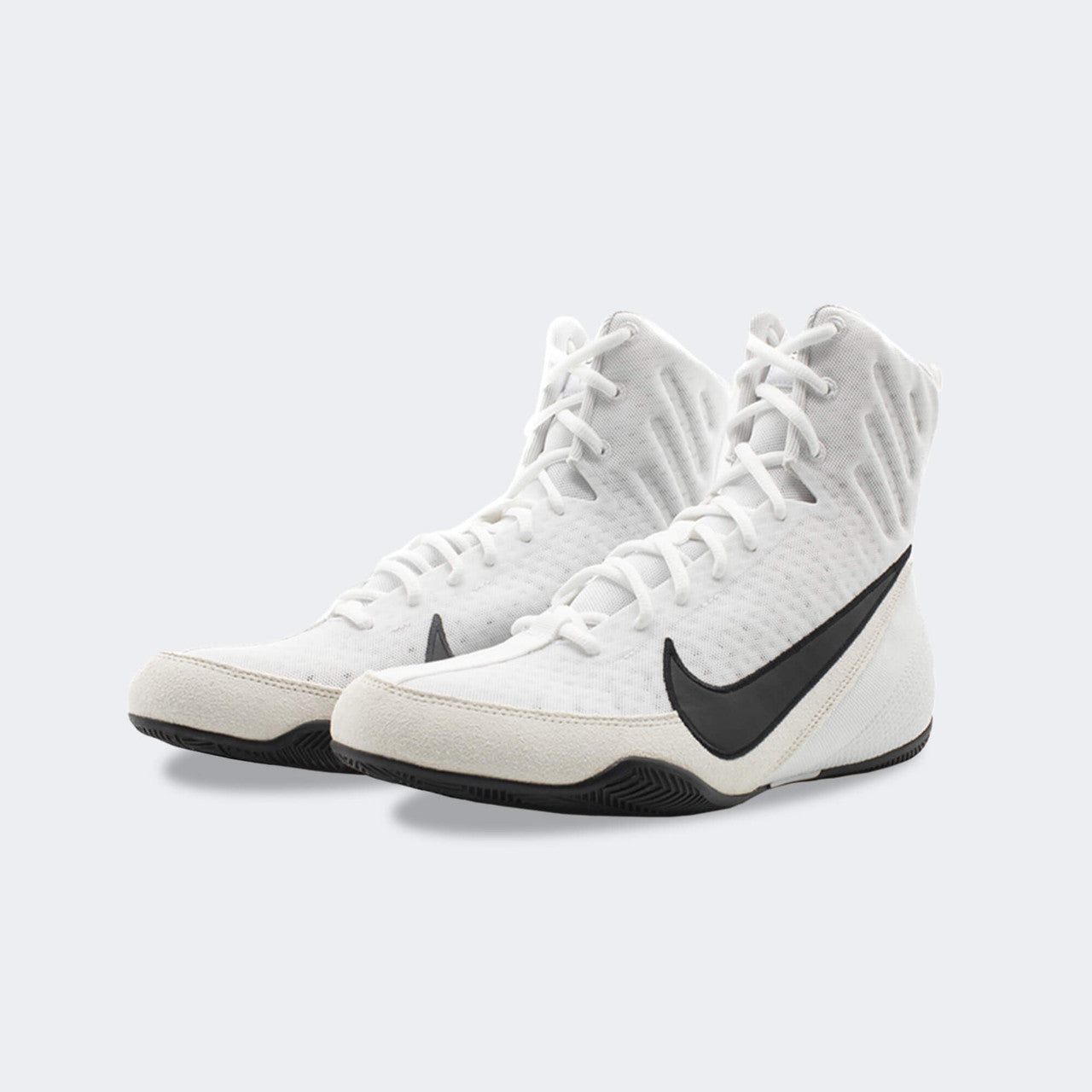 Pair of Nike Machomai 3 boxing shoes in white, viewed from a front-left angle, available at Combat Corner.