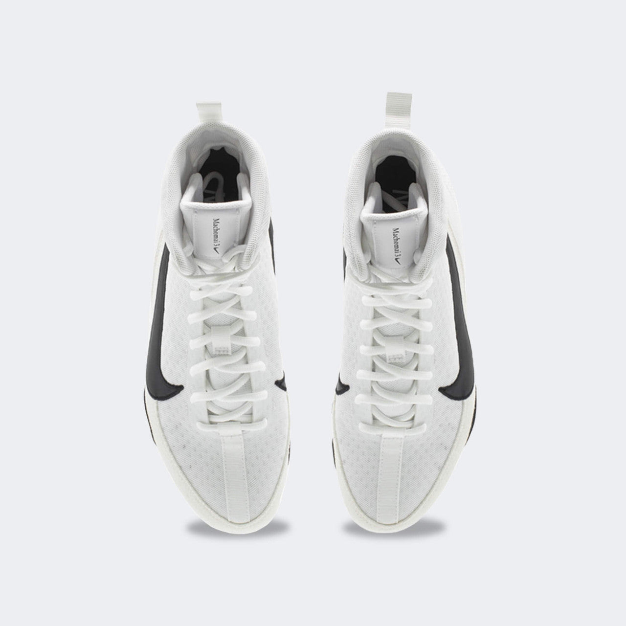Top down view of a pair of Nike Machomai 3 boxing shoes in white, available at Combat Corner.