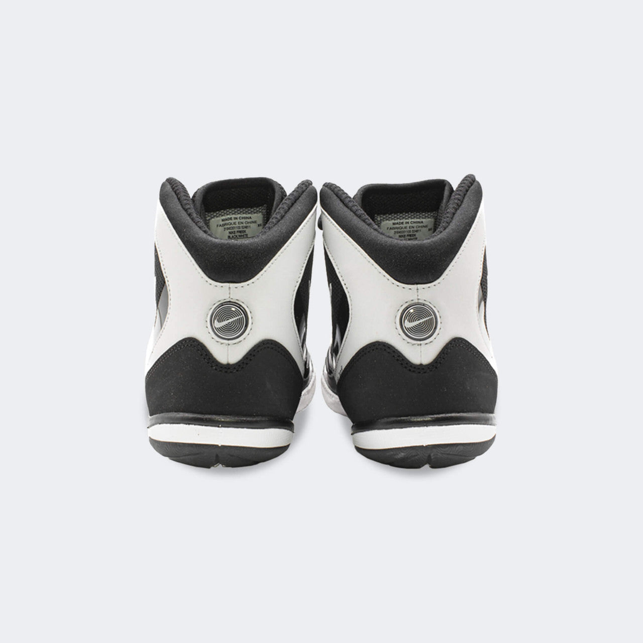 Back heel view of the Nike Freek wrestling shoes in black, available at Combat Corner.