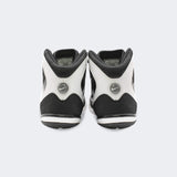 Back heel view of the Nike Freek wrestling shoes in black, available at Combat Corner.