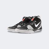 Pair of Nike Freek wrestling shoes in black, viewed from a front-left angle, available at Combat Corner.