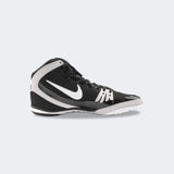 Inner left side view of the Nike Freek wrestling shoe in black, available at Combat Corner.
