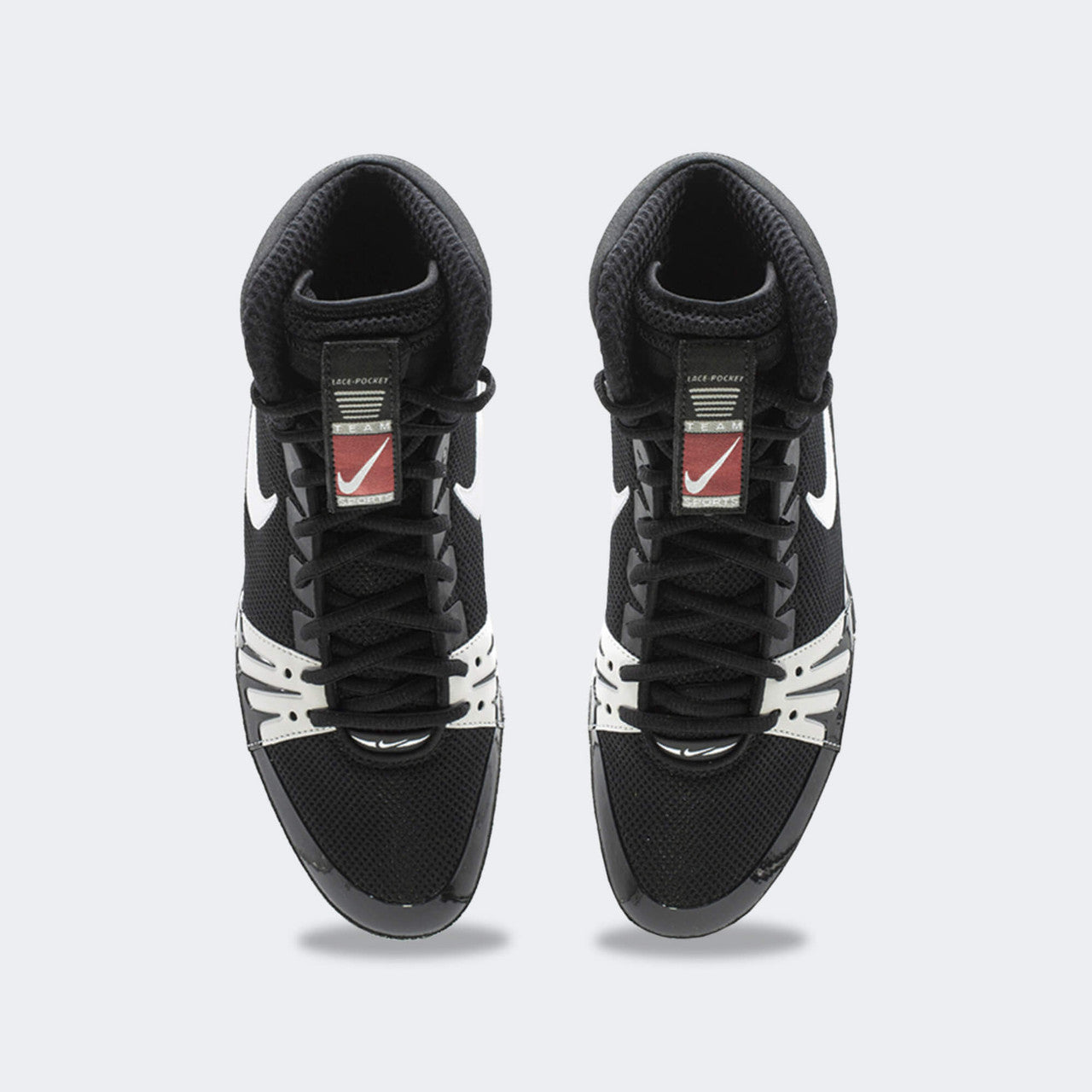 Top down view of a pair of Nike Freek wrestling shoes in black, available at Combat Corner.