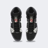 Top down view of a pair of Nike Freek wrestling shoes in black, available at Combat Corner.
