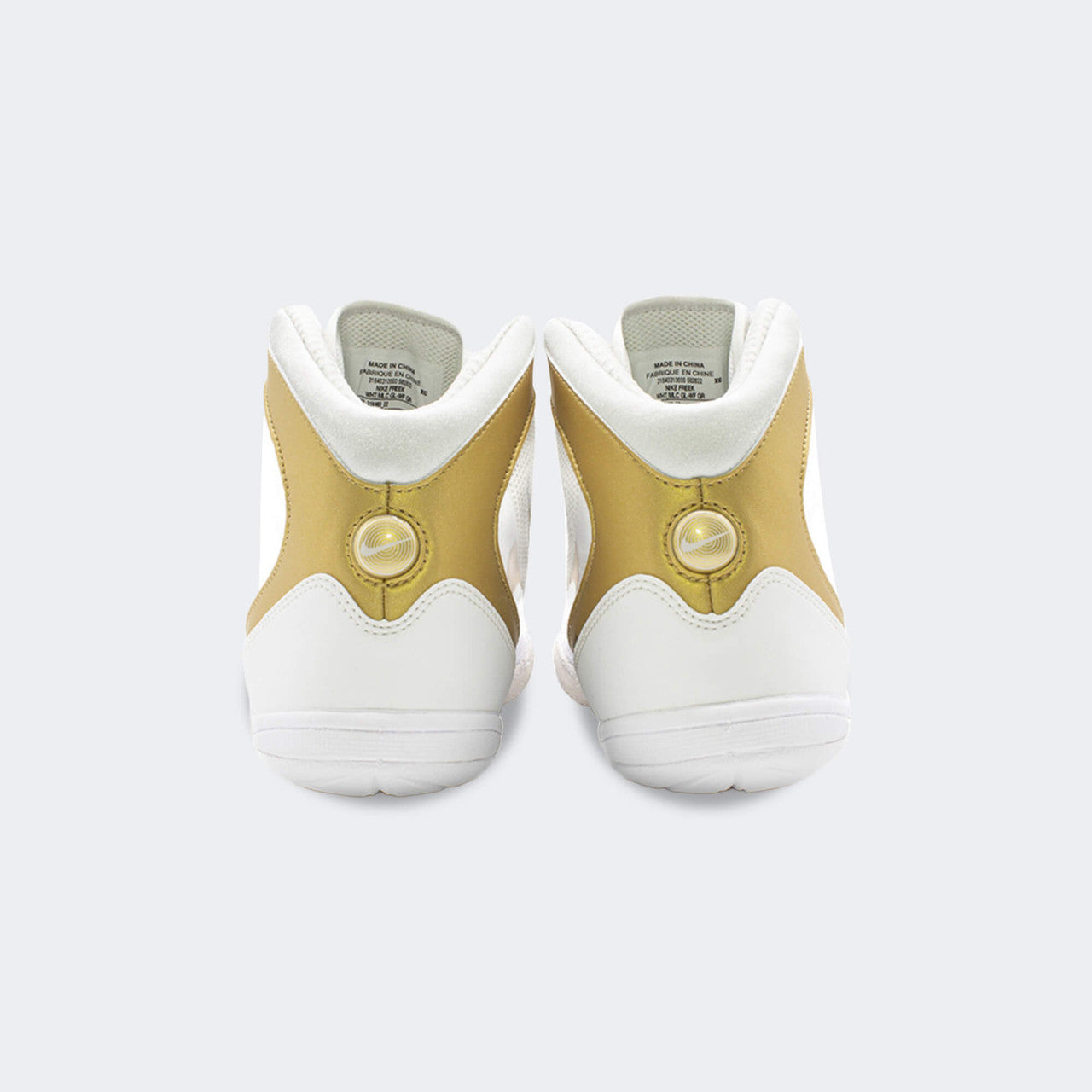 Back heel view of the Nike Freek wrestling shoes in white, available at Combat Corner.